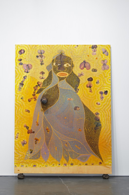 Chris Ofili, The Holy Virgin Mary, 1996. Paper collage, oil paint, glitter, polyester resin, map pins and elephant dung on linen, 96 by 72 inches. Courtesy of the artist and New Museum. Photo by Benoit Pailley.